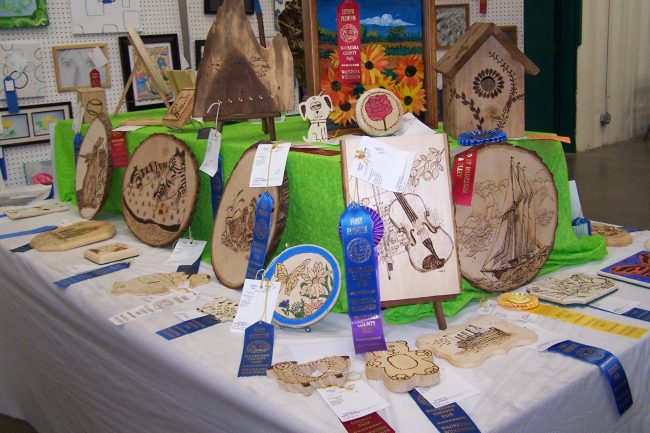 4-H wood burning projects on display at the County Fair